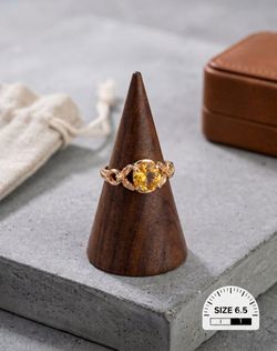 Elegant gold plated ring with yellow stone