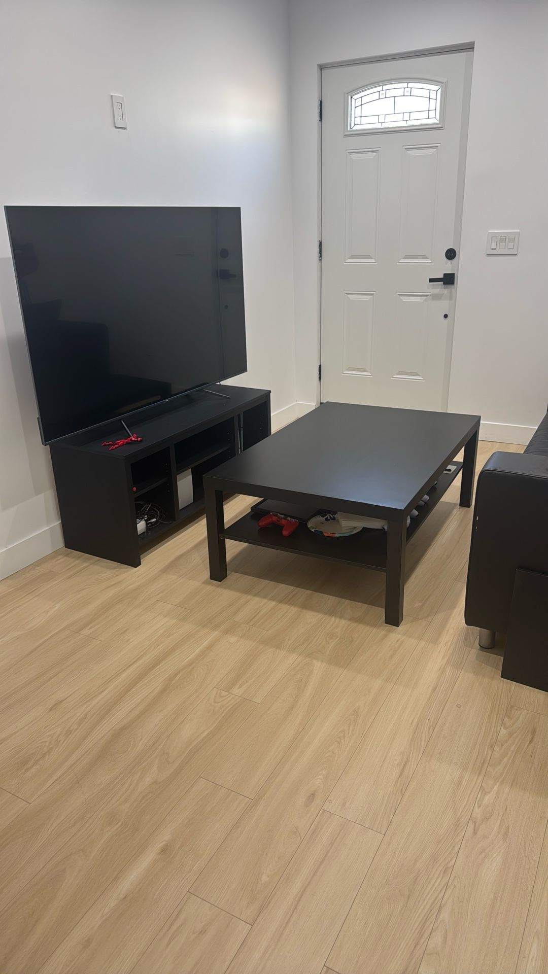 Table, TV Stand And Sofa
