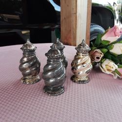 4 Vintage Salt shakers Firm Price 