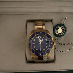 Rolex Submariner 116613LB Gold Oyster Bracelet with Blue Bezel