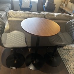 Pub Table and Leathered Pedestal Bar Stool Dining Set