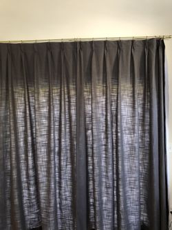 Gray Blackout Curtains w/gold rod & hardware.