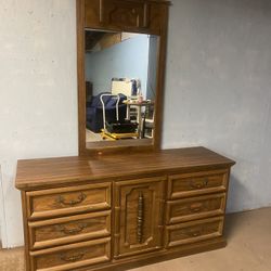 Wooden Dresser with Mirror. Dresser 63inLong X31in.. Mirror 47in Tall X28in