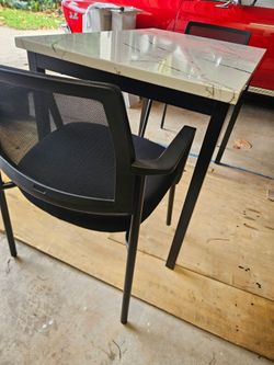 Faux Marble Top Dining Table with Black Chairs