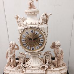 clock topper statue