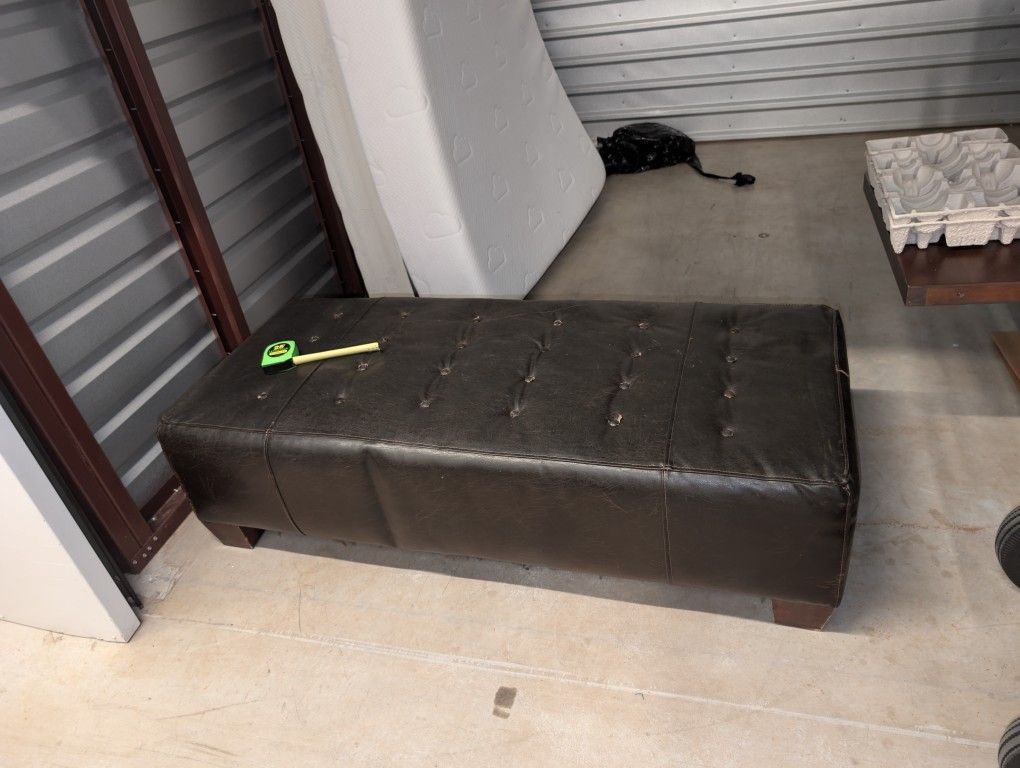 Leather foot ottoman 