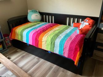Twin bed with trundle bed and mattresses