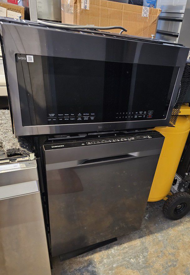 SAMSUNG DARK STAINLESS STEEL DISHWASHER WITH 3 RACKS AND MICROWAVE OVER THE RANGE...$ 550