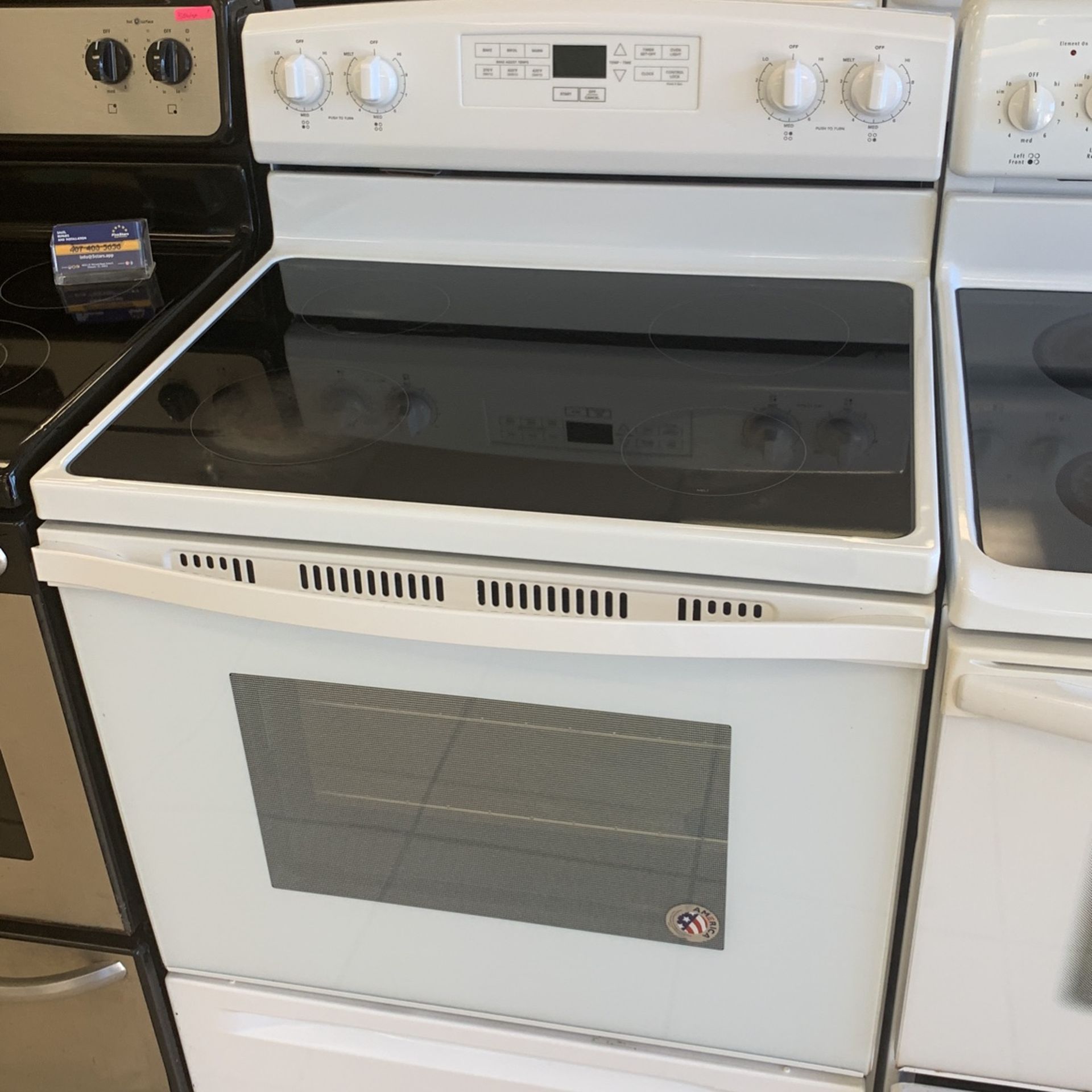 WHIRLPOOL WHITE GLASS STOVE