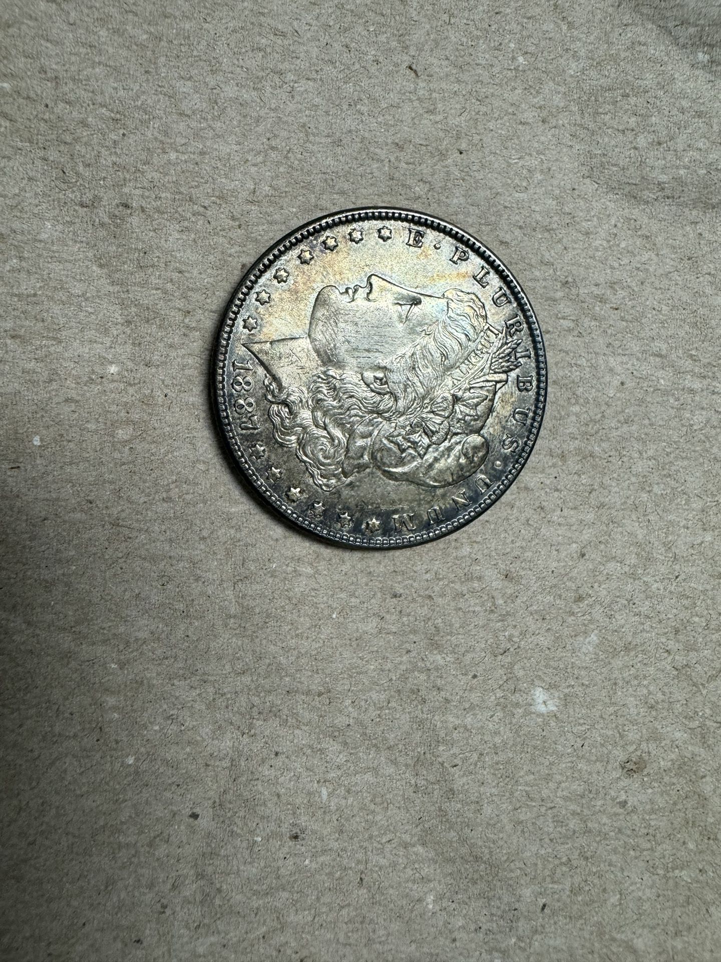 1887 Morgan Silver , one dollar coin 