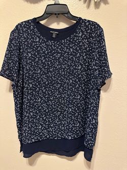 Woman’s Blue Flowered Blouse