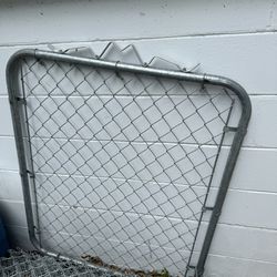 Gate Fence With A Roll Of Metal Fence 