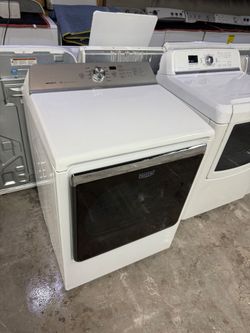 Whirlpool front load Electric Dryer, drying machine,  Clean, tested and ready to go. You may test at my location.
60 day warranty on all appliances. (