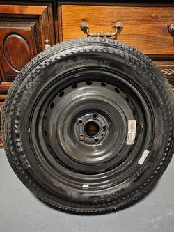 Brand New 225/60R17 Tire w/ 17" Steel Wheel ā Never Used Spare
