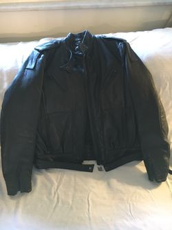 Like new leather Harley Davidson motorcycle jacket and Leather Chaps ladies jacket size 40 chaps size 16 pick up only
