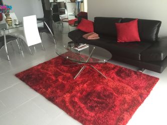 Black Leather Sofa – $200