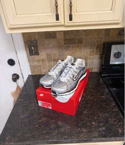 Nike p metallic silver size 11