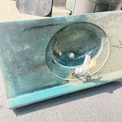 Ceramic Countertop and sink.$25