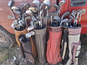 Lot Of Golf Clubs 