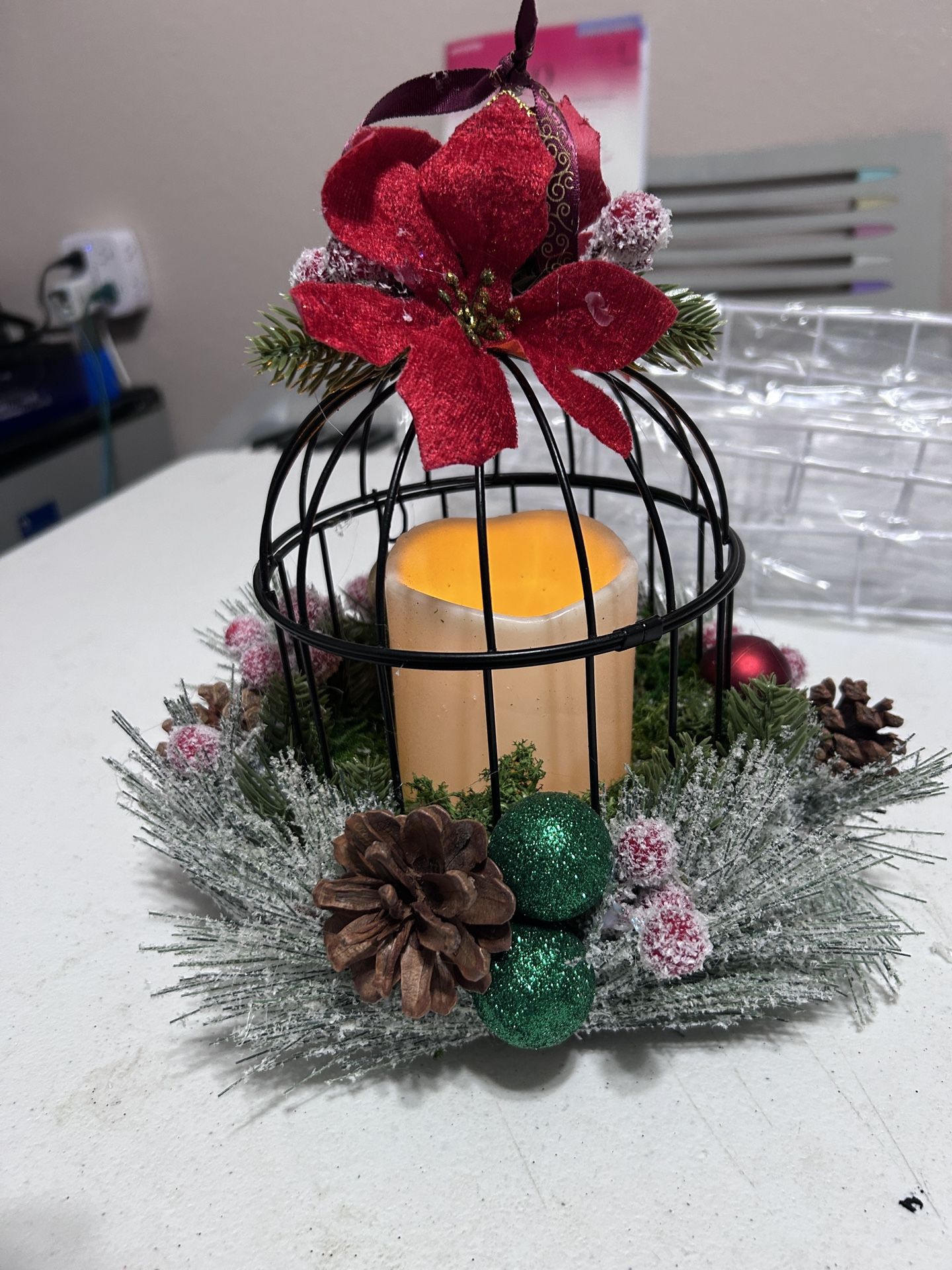 Decorated Christmas black birdcage with candle