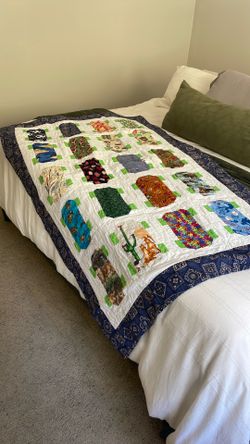 Handmade Quilt - 40” x 63”