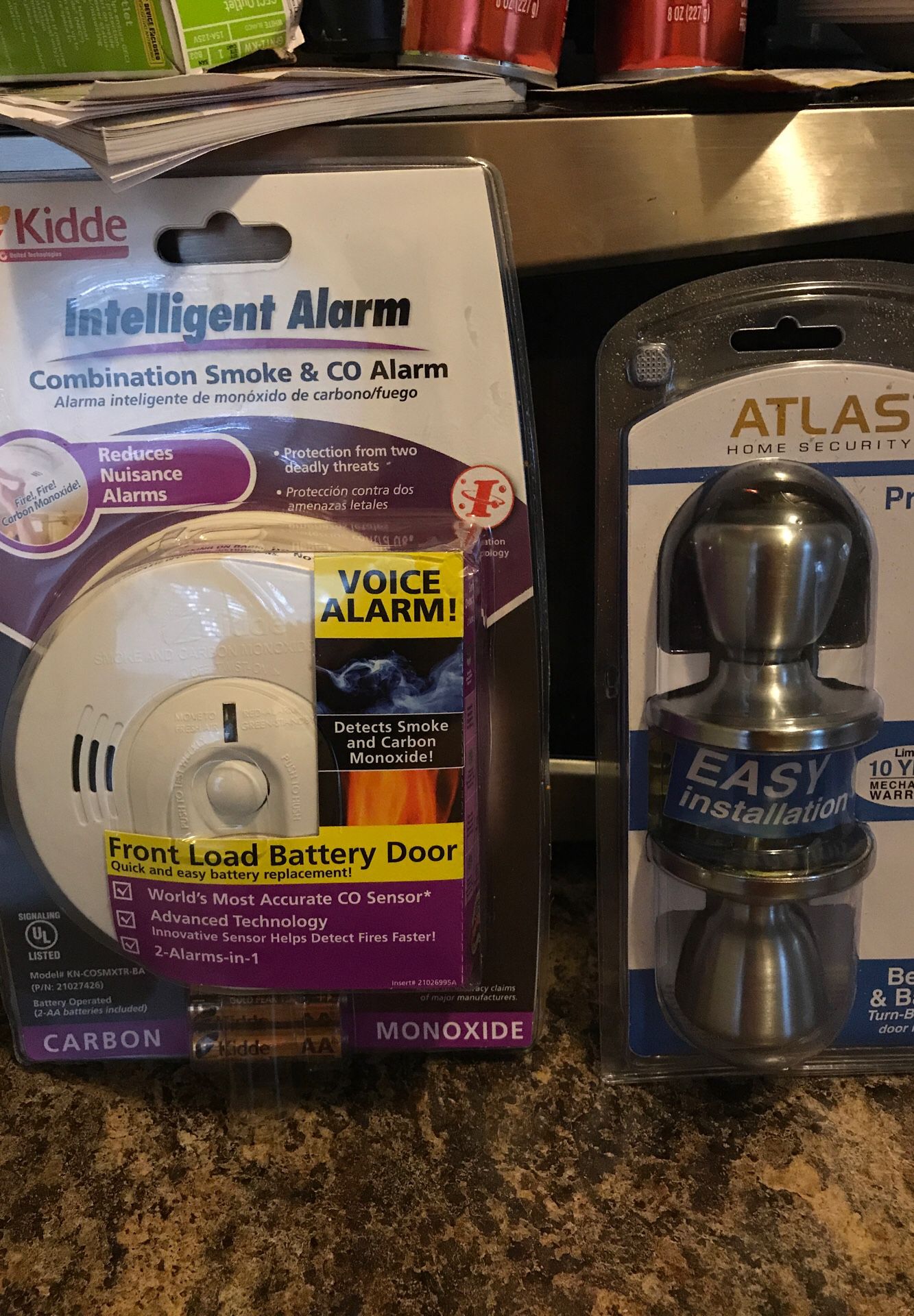Smoke and co alarm made by kiddie and brand new never been open door knobs with keys
