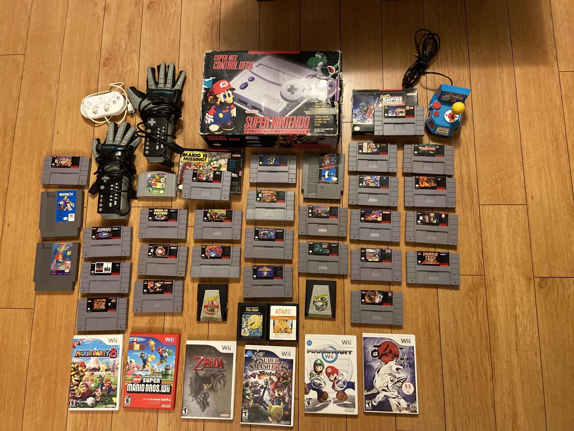 Lot of 36 plus Super Nintendo Wii and Console in box POWER Gloves Games and more