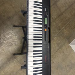 Casio keyboard and stand