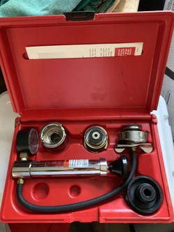 Snap on cooling system tester