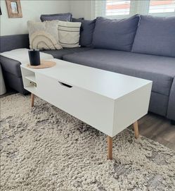Lift top coffee table with storage