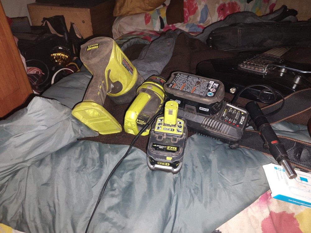 Two 4 Amp Hour Ryobi Batteries Ryobi Zen And High Beam Spotlight Ryobi Flashlight And Ryobi Charger