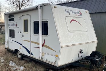 2006 Jayco Feather Sport 165 2006 Jayco Jay Feather Sport 165  18-foot, single-axle bunkhouse travel trailer featuring a dry weight of approximately 2