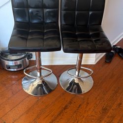 Pair of Black Faux Leather Adjustable Swivel Bar Stools