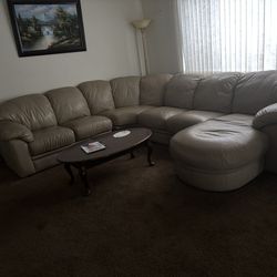 Used tan leather sectional couch
