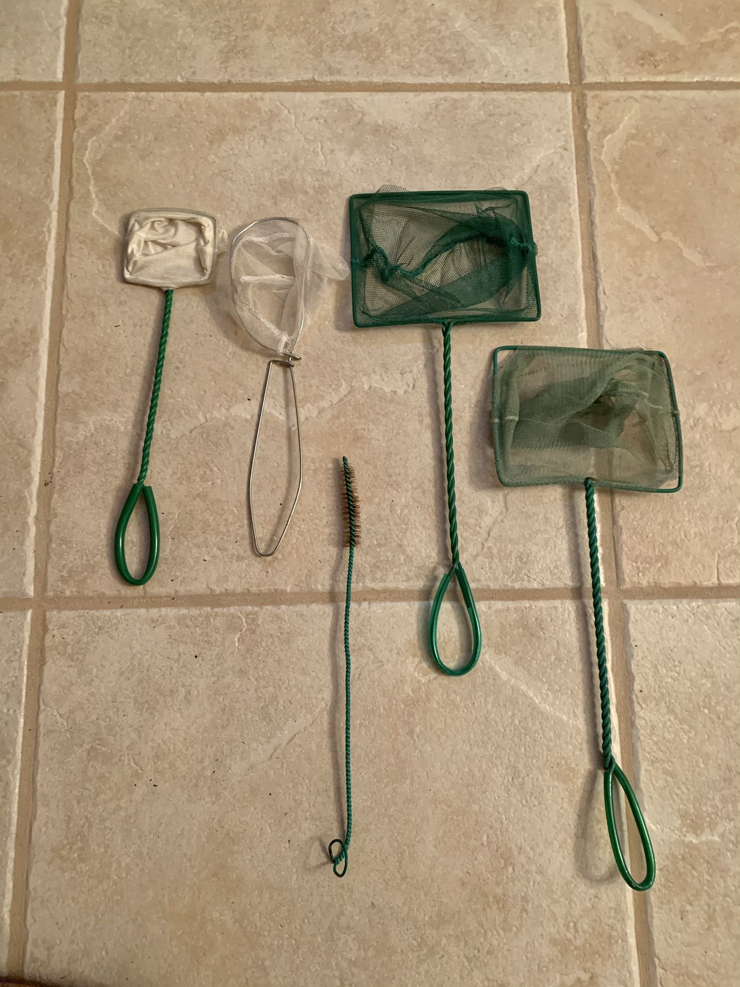 Preowned set of misc scoop nets for fish tank