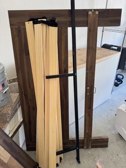 Disassembled Queen Wooden Bed Frame with Slats