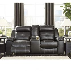 Black Reclining faux leather love seat (retails $899)