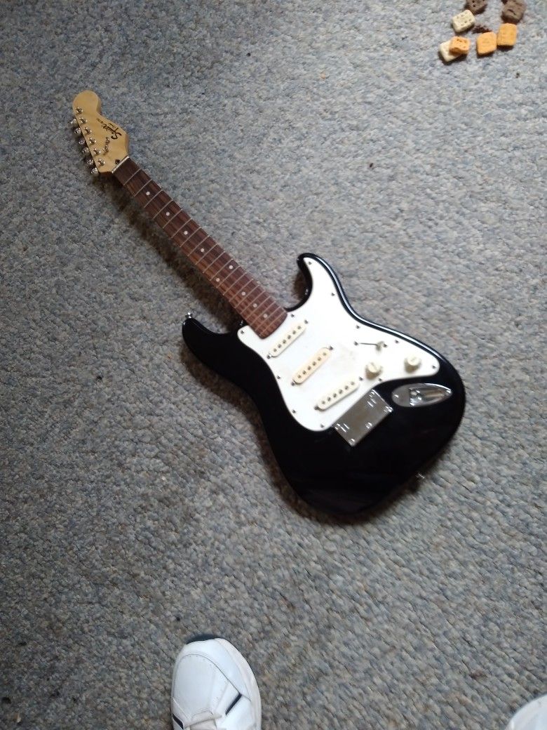 SQUIRE. BY. FENDER. MINI. 200..00. Brand New Strings If Sold