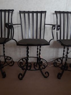 Heavy duty rought iron stools nice.