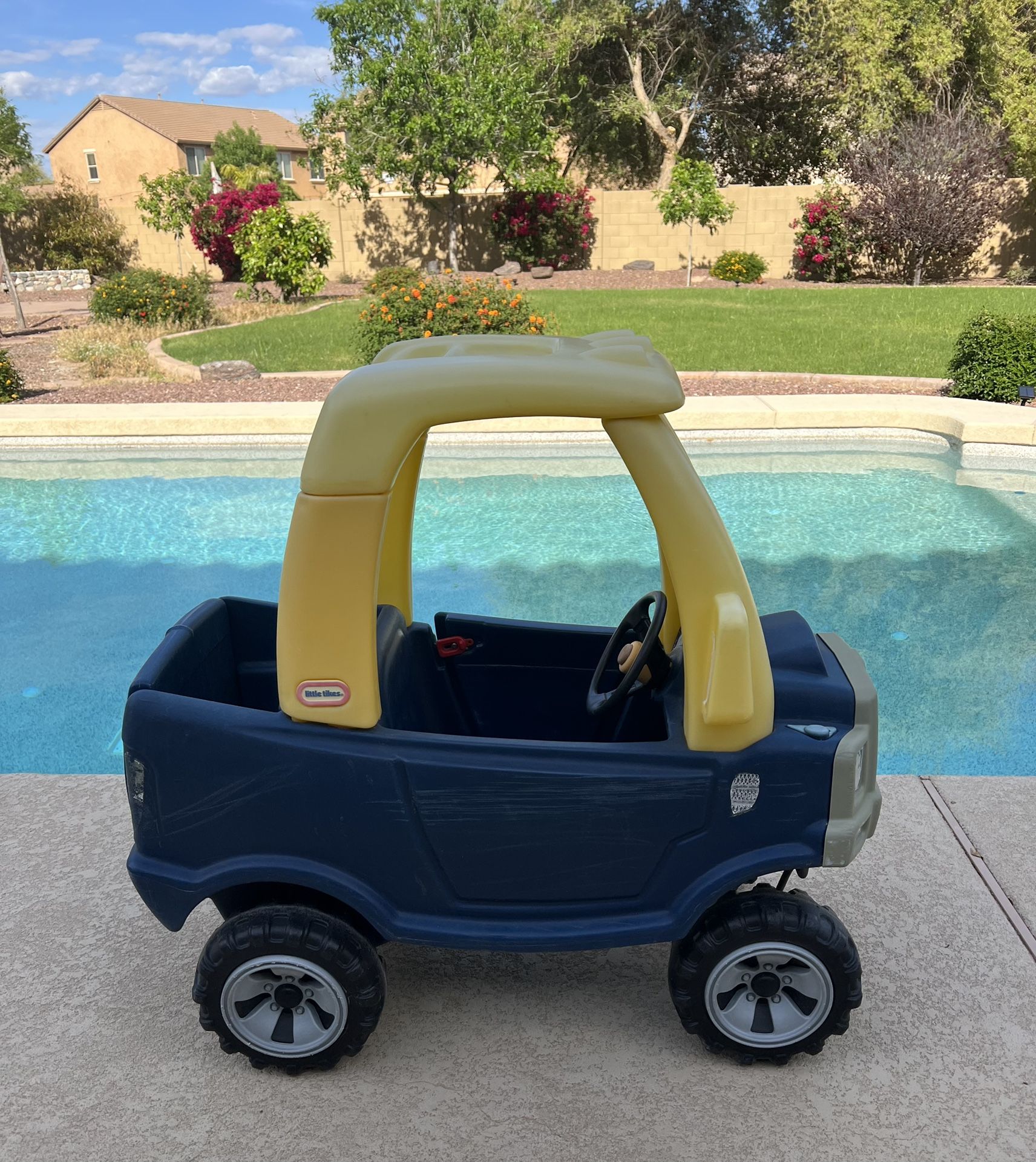 Little Tikes cozy coupe push truck in good working condition with some fading and scrapes