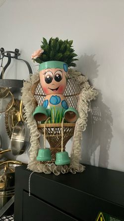 Planter of girl handmade in  Mexico newvintage peacock chair