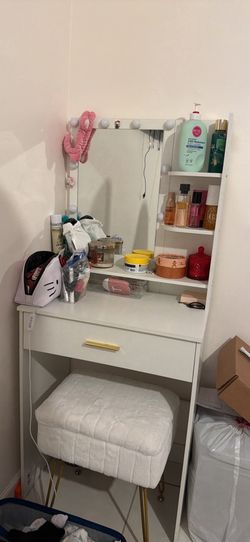 Makeup vanity and chair