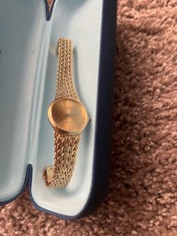 Women’s Baume and Mercier 14k gold watch