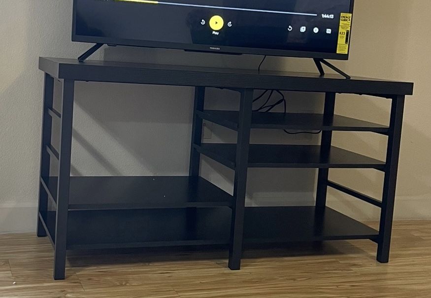 Adjustable Storage TV Stand for TVs up to 50" Black Wood Grain Finish - Room Essentials™