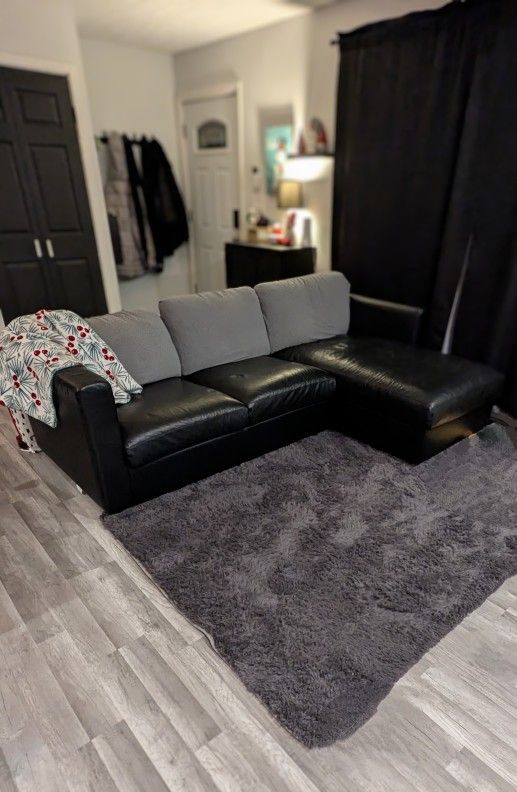 Black leather Sofa With Chaise (with Storage)
