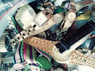 Bag of watches and parts