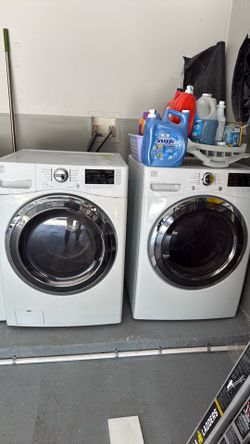 Kenmore Elite Front Load Washer & Dryer Set – Good Working Condition with some cosmetic wear.
