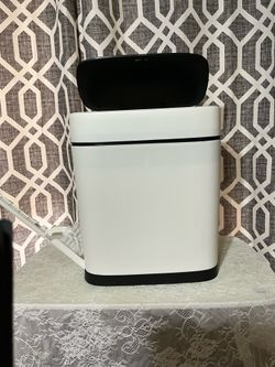 Bathroom trash can with toilet brush
