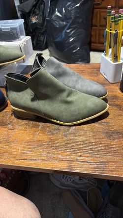 Female low cut olive green boots.