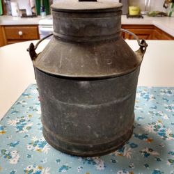 Vintage Galvanized Milk Can with lid and handle intact.